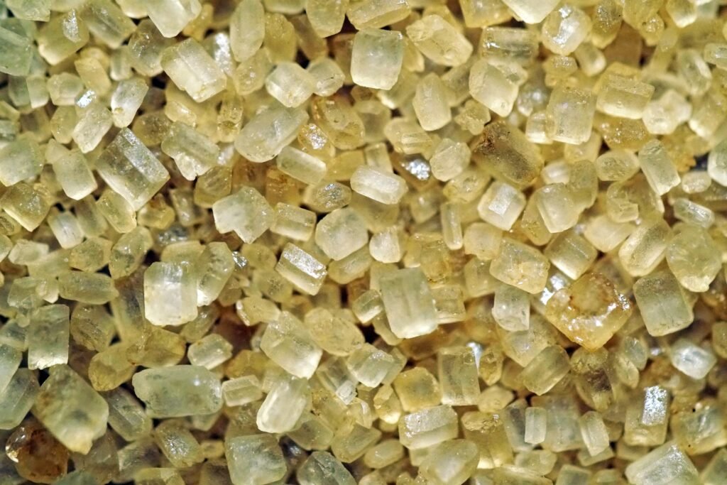 A beautiful closeup shot of yellow cane sugar macro - perfect for background